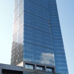 Ascott looks like two towers, in which the corner of the tower at the back melds with the side of the building in front, making them a single tower situated on a podium. This picture is the view from the northbound side of 5th Ave.