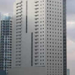 The Bonifacio One Technology Tower is the light-gray building in the foreground. It was shot from along 28 St. between 4th Avenue and 5th Ave.