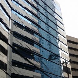 V Corporate Center is a building with wide frontage and is literally V in shape; only half of the V is visible in this picture.